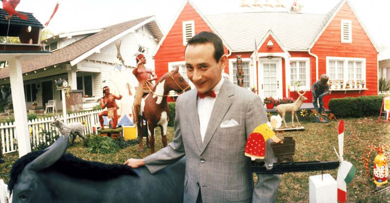 Pee Wee (Paul Reubens) in front of his magnificent home.