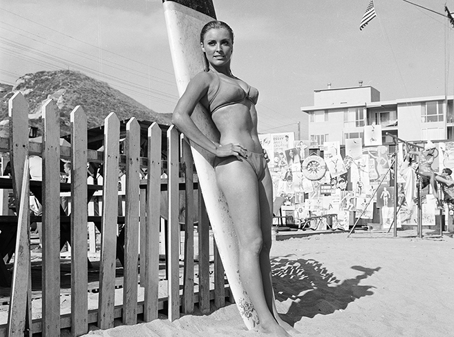 the stunning Sharon Tate in a publicity shot for the 1967 beachcombing romp Don't Make Waves, also starring Tony Curtis. Tate was sadly and viciously murdered by the Manson Family two years later when her career was just taking off.